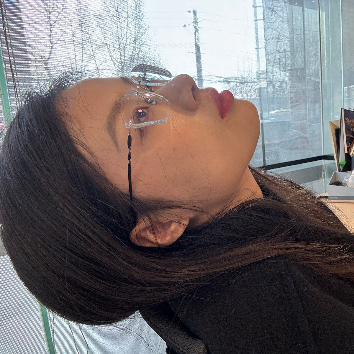 TONO eyeglasses worn by model
